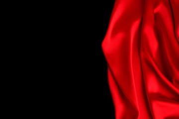 Red silk or satin luxury fabric texture can use as abstract background. Top view