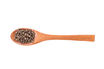 Black pepper on wooden spoon isolated on a white background. Spice in wooden spoon. Top view