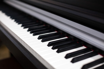 Fototapeta na wymiar White and black keys musical instrument piano