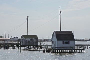 Shacks along the coast of Tangier Island, Virginia, in the Chesapeake Bay. Since 1850 the...