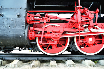 Part of the old railway locomatine standing on the rails