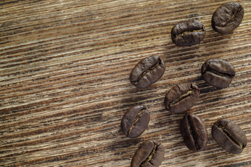 coffee beans on a wooden background