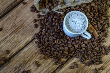 coffee beans on a wooden background