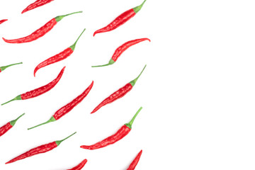 red hot chili peppers isolated on white background with copy space for your text. Top view. Flat lay pattern