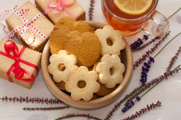 Wooden bowl with delicious cookies.