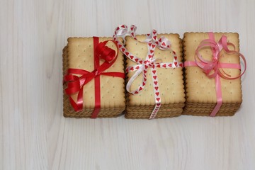Cookies on white wooden background.