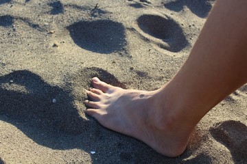 Foot in the sand