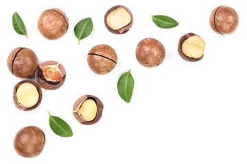 Shelled and unshelled macadamia nuts with leaves isolated on white background with copy space for your text. Top view. Flat lay pattern