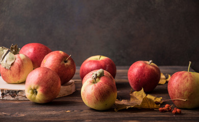 aromatic autumn apples on a wooden table