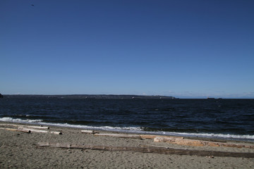 A view of container ships on the horizon