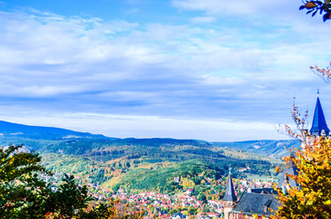 Autumn landscape with castle of Wernigerode in Germany