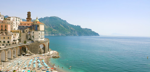Stunning sunny view of Atrani village overhanging the sea, Amalfi Coast, Italy. Banner panorama. Copy space. - obrazy, fototapety, plakaty