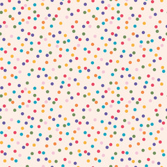 Lovely bright colorful wild polka dot pattern on cream coloured background. Suitable for party invitations, card design or fabrics.