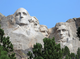 detail of the iconic carvings of presidents Washington, Jefferson, Roosevelt and Lincoln, Mount...