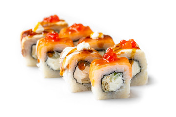 Closeup set of philadelphia sushi rolls decorated with caviar isolated at white background.