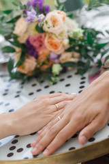 Close-up of wedding hands with rings
