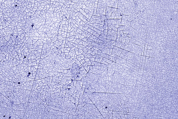 Crack and damage on painted texture in blue tone.