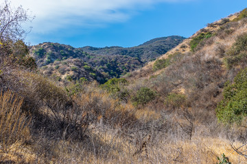 Light winds blow clouds over Southern California mountains in early fall