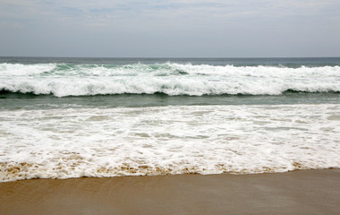 A view of Karon beach on a misty day, Phuket, Thailand
