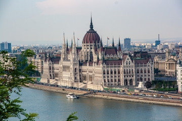 Fototapeta na wymiar Panoramic picture from the Budapest Gellertberg towards the old town with the parliament.