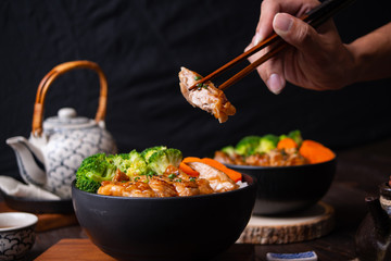 Japanese food, fried pork on rice, topped with sauce, Japanese style