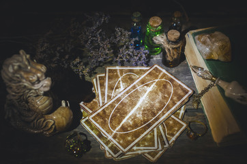 Tarot cards on fortune teller desk table background. Futune reading concept. Divination.