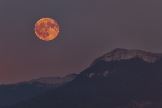 Full moon rising over Baio peak in Alava
