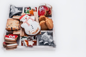 Glazed Christmas cookies, gingerbread cookies. Decorated with Christmas decorations