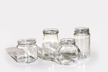 jars isolated white background glass shadow table gray glassware set empty four clear transparent black