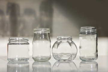 jars isolated white background glass shadow table gray glassware set empty four clear transparent black