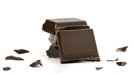 Chocolate pieces on white background