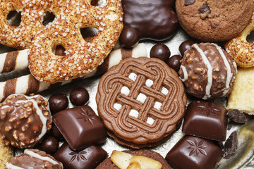 Mix of sweets: cookies, chocolates and pralines