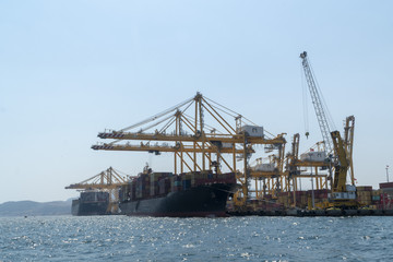 Fototapeta na wymiar Docked container cargo ship at port.