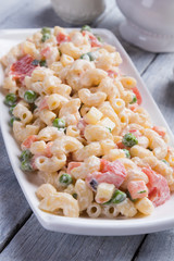 Homemade macaroni salad with vegetables