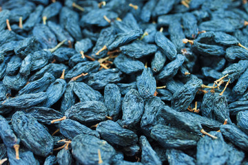 Background of dark raisins, dried grapes