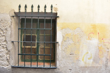 an old window in Loano, Italy