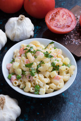 Homemade macaroni salad with vegetables