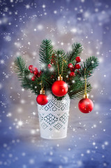 Christmas background with xmas fir branches and decorations. Christmas greeting postcard.