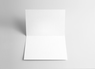 Blank open card over gray background 