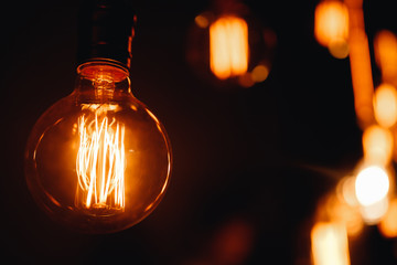 Set edison retro lamp on loft gray concrete black background.