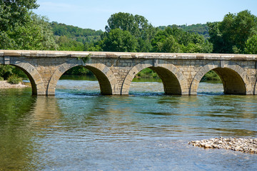 Fototapeta na wymiar Bridge Over Ceze River At Monclus Gard Occitanie France