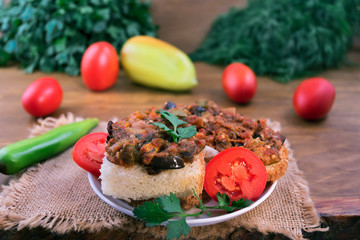 Sandwiches with fried vegetables, parsley and tomatoes.