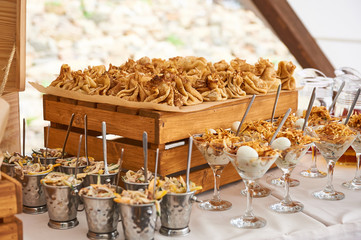 Fototapeta na wymiar catering services with snacks table in the restaurant at the event party