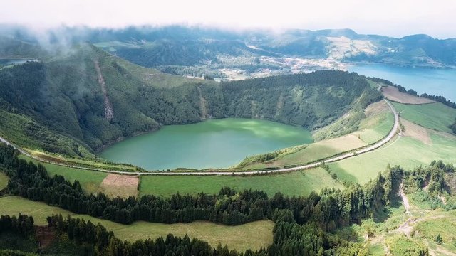 Flying over of Boca do Inferno, lakes in Sete Cidades volcanic craters on San Miguel island, Azores, Portugal. 