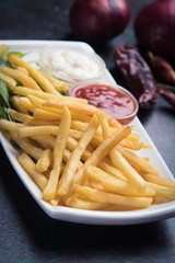 French fries with ketchup and mayonnaise