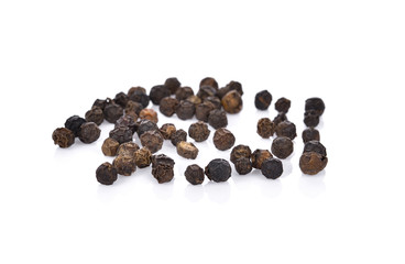 Black pepper on white background