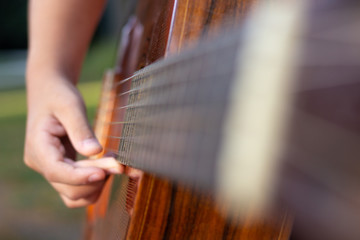 Boy playing classical guitar