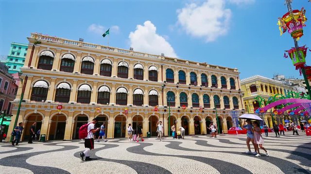 MACAU, CHINA - SEPTEMBER 5, 2018: People walking around Senado Square in Macau 