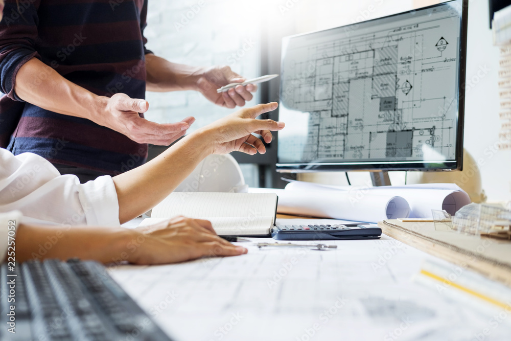 Aufkleber professional architect designer structural engineer team colleagues working office looking computer 