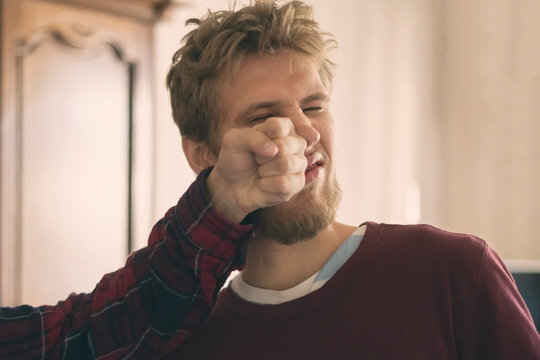 Two Young Men Fight Each Other And Punch Fist In Face Close Up  F